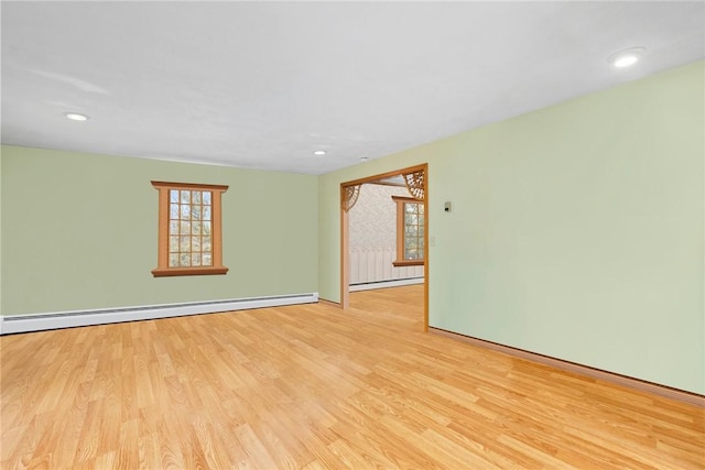 6 Lake Dr, North Providence, RI 02904 - spare room with a baseboard radiator, wood finished floors, a baseboard heating unit, baseboards, and recessed lighting