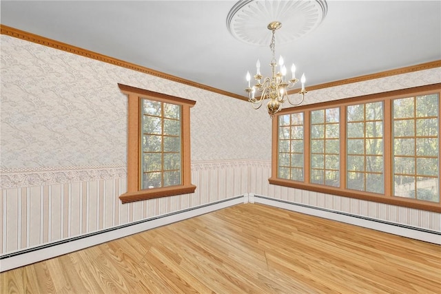 6 Lake Dr, North Providence, RI 02904 - empty room featuring wallpapered walls, wood finished floors, a chandelier, wainscoting, and a baseboard radiator