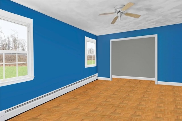 6 Lake Dr, North Providence, RI 02904 - unfurnished room with baseboard heating, plenty of natural light, baseboards, and ceiling fan