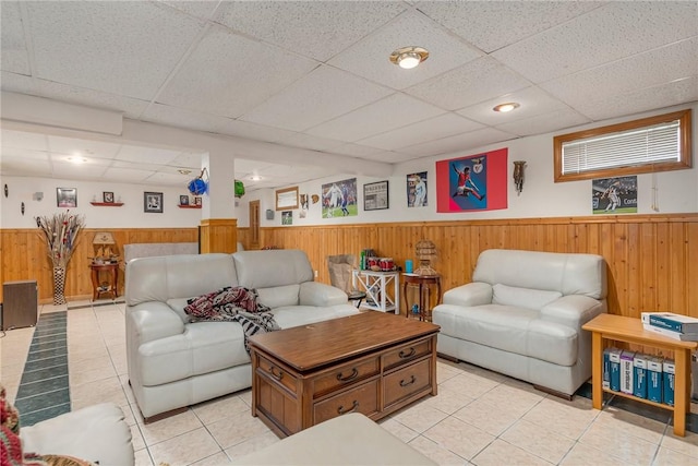6 Lake Dr, North Providence, RI 02904 - living room with a wainscoted wall, wood walls, a drop ceiling, and light tile patterned flooring