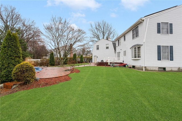 6 Lake Dr, North Providence, RI 02904 - view of grassy yard featuring a deck and a patio