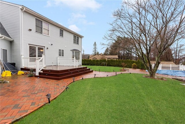 6 Lake Dr, North Providence, RI 02904 - view of green lawn featuring a patio area and a deck