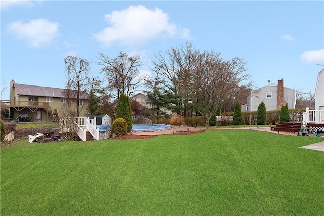 6 Lake Dr, North Providence, RI 02904 - view of grassy yard with stairway and a deck