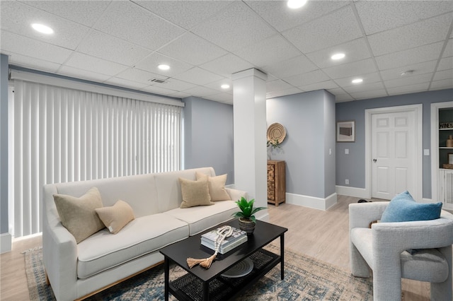 22 Halsey St Unit 1, Providence, RI 02906 - living area with light wood-style flooring, baseboards, a paneled ceiling, and recessed lighting