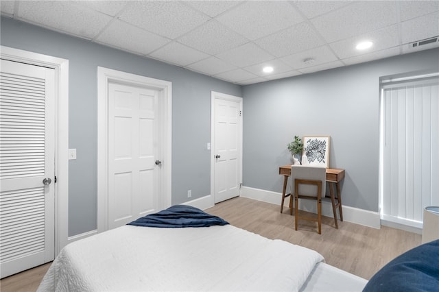 22 Halsey St Unit 1, Providence, RI 02906 - bedroom with wood finished floors, a paneled ceiling, recessed lighting, and baseboards