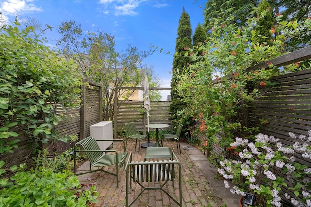 22 Halsey St Unit 1, Providence, RI 02906 - fenced backyard with a patio