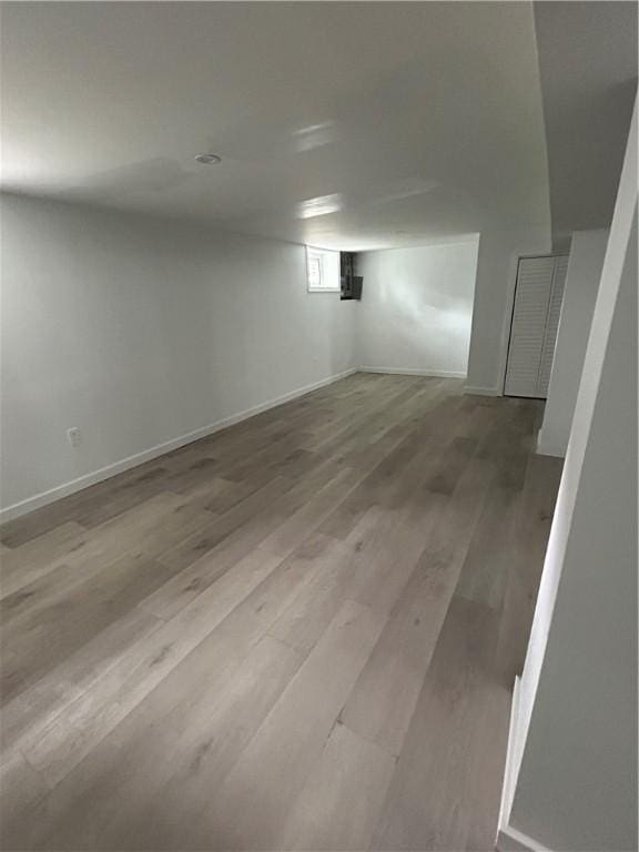 26 Mayflower St, East Providence, RI 02914 - basement with baseboards and wood finished floors