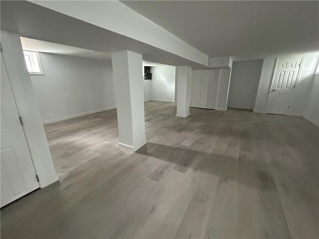 26 Mayflower St, East Providence, RI 02914 - basement featuring wood finished floors and baseboards