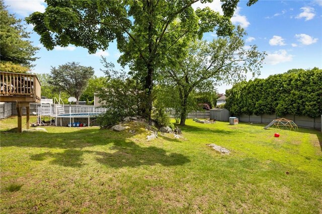 5 Olivia Ct, Johnston, RI 02919 - view of yard with an outdoor pool and a deck