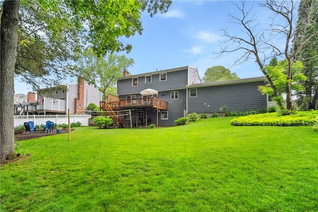 67 Hathaway Dr, West Warwick, RI 02893 - back of house with a wooden deck, stairs, and a chimney