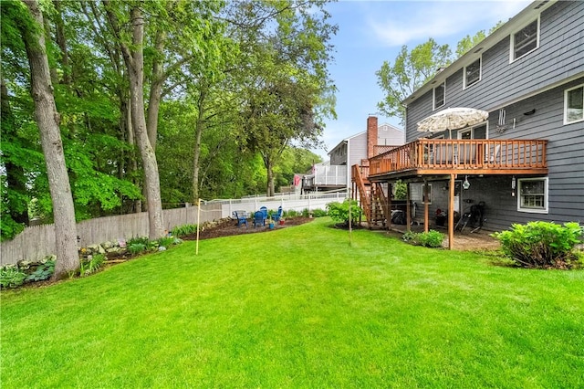 67 Hathaway Dr, West Warwick, RI 02893 - view of yard featuring a deck and stairway