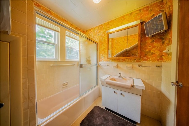 102 Buttonwoods Ave, Warwick, RI 02886 - bathroom featuring tile walls, an AC wall unit, vanity, wallpapered walls, and enclosed tub / shower combo