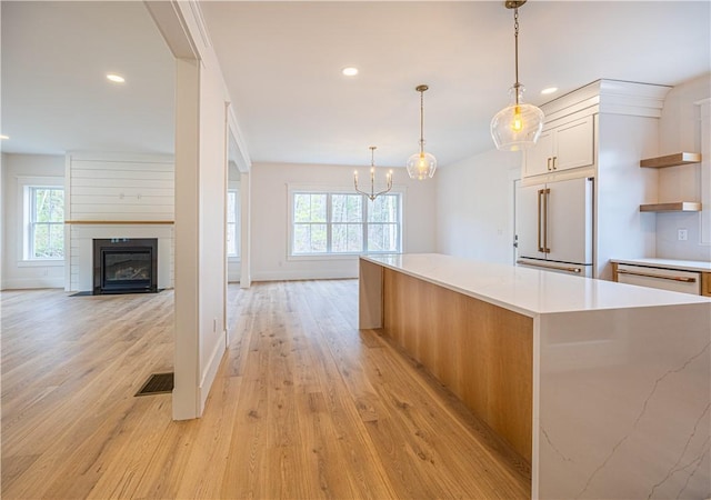 757 Cooper Rd, Glocester, RI 02814 - kitchen featuring paneled built in fridge, a large island, open shelves, a chandelier, and recessed lighting