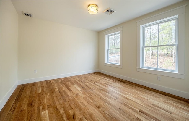 757 Cooper Rd, Glocester, RI 02814 - unfurnished room featuring healthy amount of natural light, light wood-style flooring, and baseboards