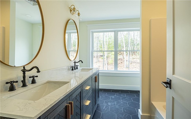 757 Cooper Rd, Glocester, RI 02814 - full bathroom with double vanity, tile patterned flooring, and a tub to relax in