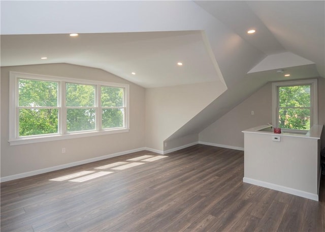 126 Hilton St, Tiverton, RI 02878 - bonus room with lofted ceiling, plenty of natural light, dark wood-type flooring, baseboards, and recessed lighting