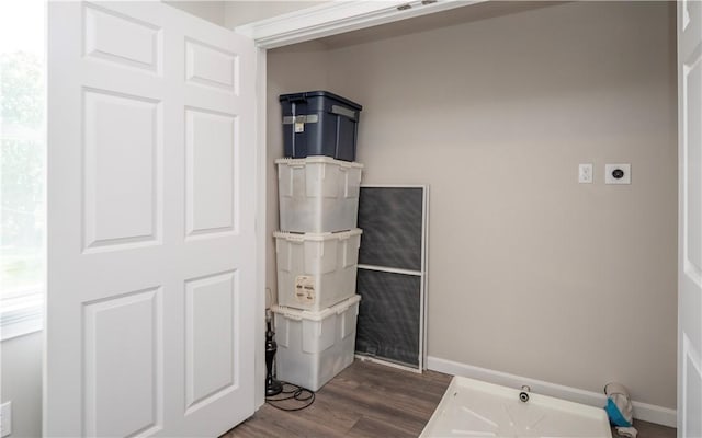 126 Hilton St, Tiverton, RI 02878 - washroom with electric dryer hookup, dark wood-style flooring, and baseboards