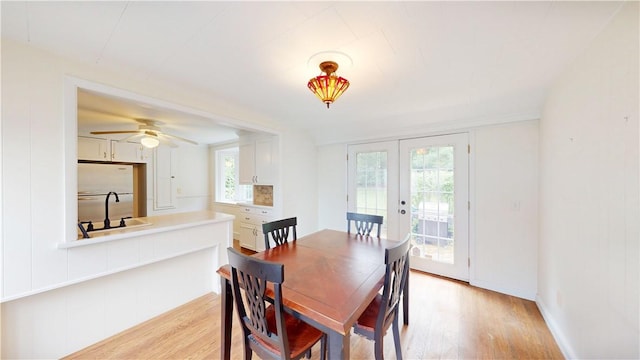15 Franconia Dr, Cranston, RI 02920 - dining room featuring light wood finished floors, french doors, and ceiling fan