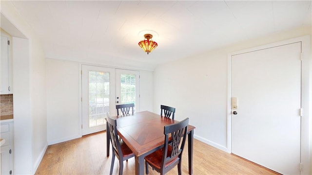 15 Franconia Dr, Cranston, RI 02920 - dining room with light wood-style floors, french doors, and baseboards