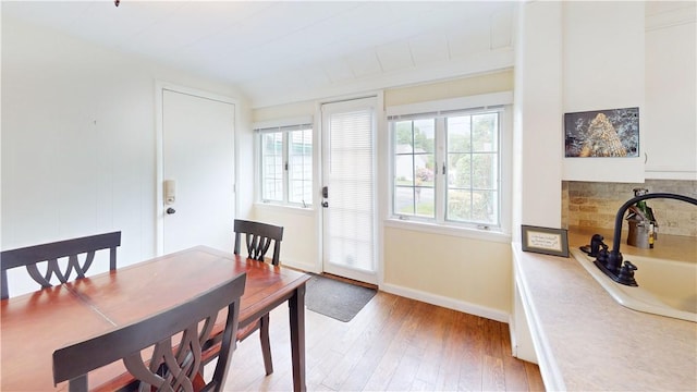 15 Franconia Dr, Cranston, RI 02920 - dining area featuring light wood-style floors and baseboards