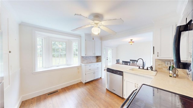 15 Franconia Dr, Cranston, RI 02920 - kitchen featuring dishwasher, tasteful backsplash, crown molding, white cabinets, and light wood finished floors