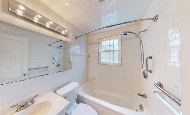 15 Franconia Dr, Cranston, RI 02920 - bathroom featuring shower / bathtub combination, toilet, tile walls, and vanity