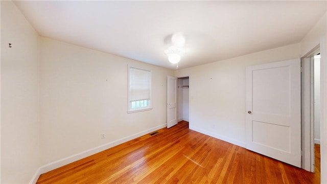 15 Franconia Dr, Cranston, RI 02920 - unfurnished bedroom featuring a closet, light wood-style flooring, and baseboards