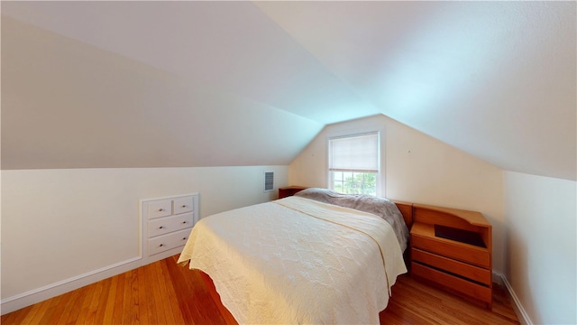 15 Franconia Dr, Cranston, RI 02920 - bedroom with wood finished floors, lofted ceiling, and baseboards
