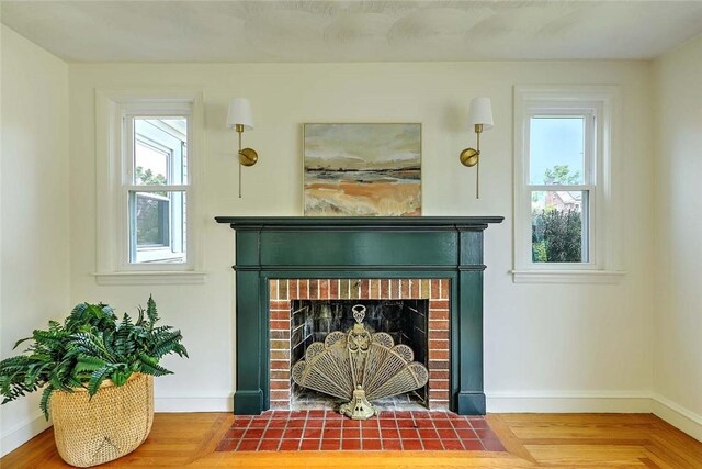 23 Robert Cir, Cranston, RI 02905 - detailed view of a brick fireplace and baseboards