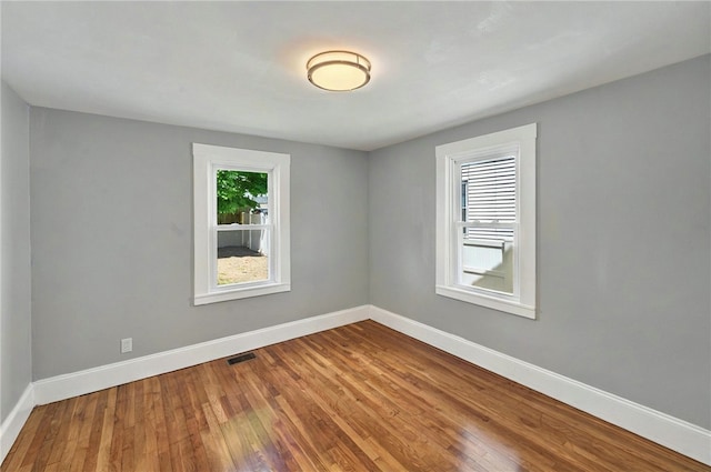 111 Cleveland St, Pawtucket, RI 02860 - spare room with baseboards and wood-type flooring