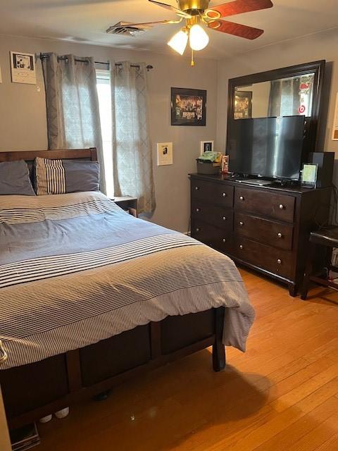 80 Capwell Ave, Woonsocket, RI 02895 - bedroom featuring light wood-style floors and a ceiling fan