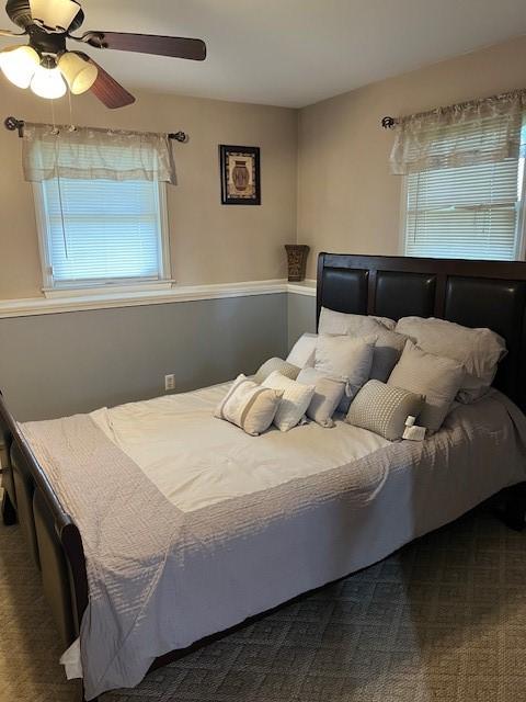 80 Capwell Ave, Woonsocket, RI 02895 - bedroom with multiple windows, a ceiling fan, and carpet floors