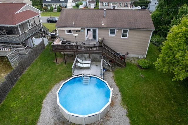 80 Capwell Ave, Woonsocket, RI 02895 - rear view of house with a deck, stairway, and a patio