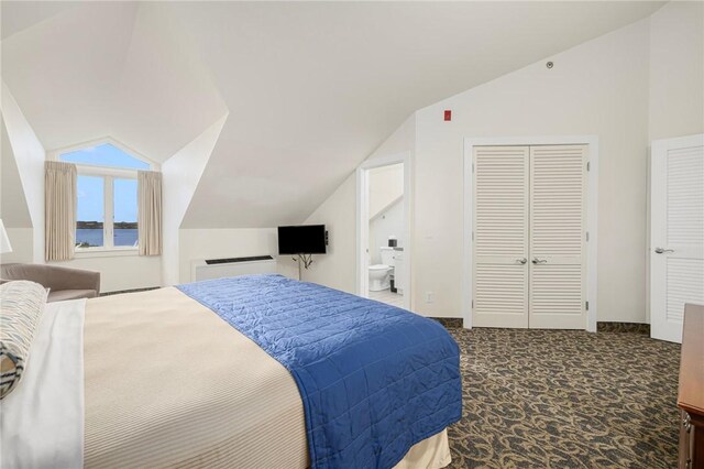 65 Ridge Rd Unit T11/W38, Newport, RI 02840 - bedroom featuring vaulted ceiling, carpet, ensuite bath, and a closet