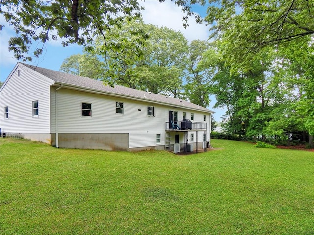 2 Laurel Hill Dr, Westerly, RI 02891 - rear view of house with a yard and a wooden deck