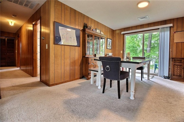 2 Laurel Hill Dr, Westerly, RI 02891 - dining space featuring wooden walls and light colored carpet