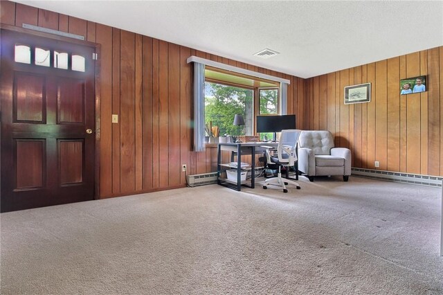 2 Laurel Hill Dr, Westerly, RI 02891 - carpeted home office featuring a baseboard heating unit and wooden walls