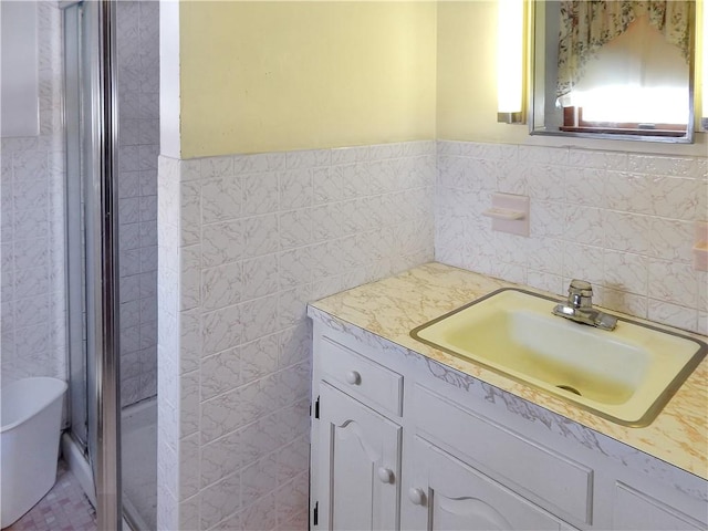 2 Laurel Hill Dr, Westerly, RI 02891 - bathroom with tile walls, vanity, a shower stall, and wainscoting