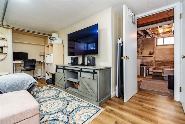 59 Davis Ave, Cranston, RI 02910 - living room with light wood-style floors, crown molding, and wood walls
