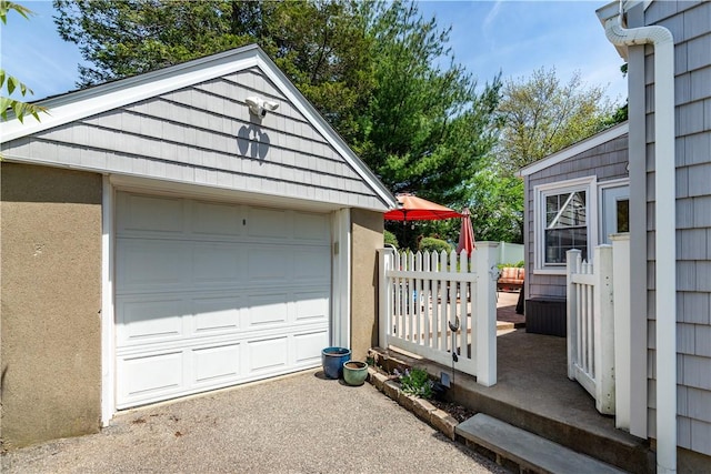 59 Davis Ave, Cranston, RI 02910 - detached garage featuring asphalt driveway