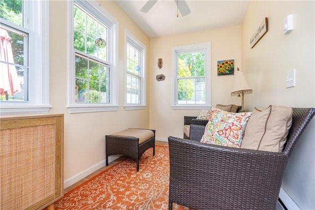 59 Davis Ave, Cranston, RI 02910 - living area with ceiling fan and baseboards
