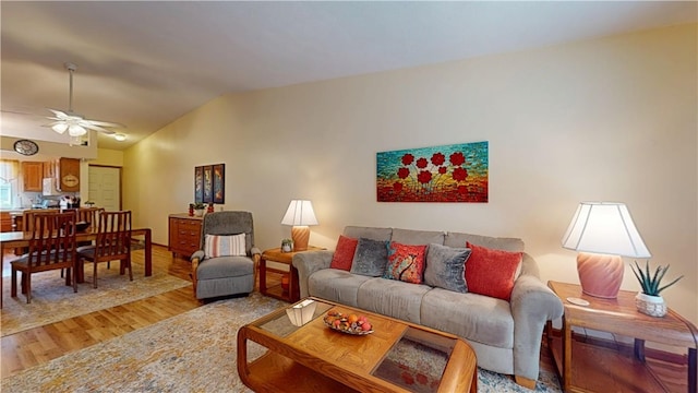 127 Pleasant View Ave Unit 34, Smithfield, RI 02917 - living area with light wood-style floors, lofted ceiling, and a ceiling fan
