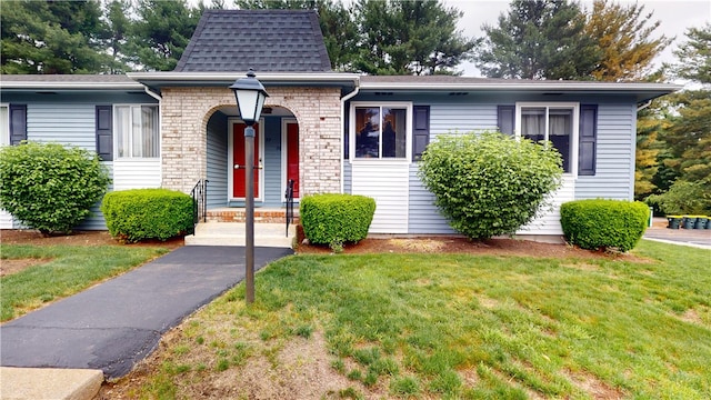 127 Pleasant View Ave Unit 34, Smithfield, RI 02917 - view of front of property featuring a front yard and a shingled roof