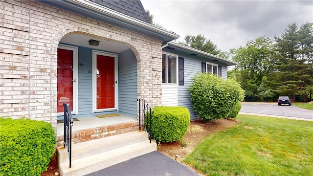 127 Pleasant View Ave Unit 34, Smithfield, RI 02917 - entrance to property with a yard and brick siding