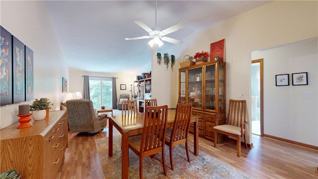 127 Pleasant View Ave Unit 34, Smithfield, RI 02917 - dining area featuring light wood-style floors, lofted ceiling, and ceiling fan