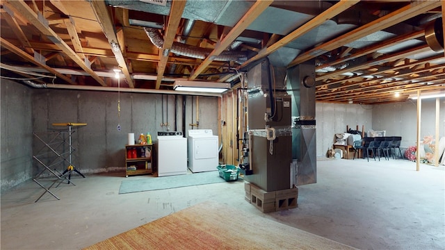 127 Pleasant View Ave Unit 34, Smithfield, RI 02917 - unfinished below grade area featuring independent washer and dryer and heating unit