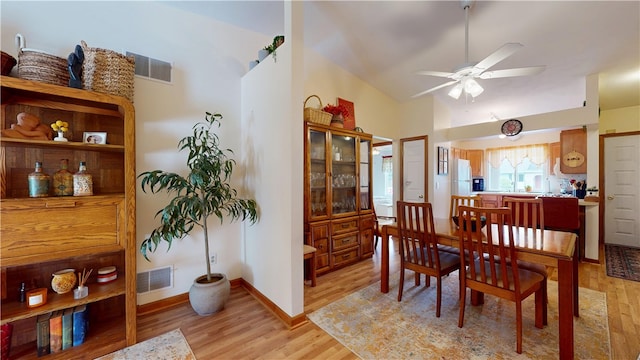 127 Pleasant View Ave Unit 34, Smithfield, RI 02917 - dining area featuring light wood finished floors, a ceiling fan, and vaulted ceiling
