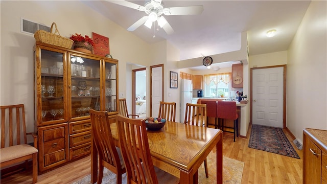 127 Pleasant View Ave Unit 34, Smithfield, RI 02917 - dining room with light wood-style flooring, a ceiling fan, and vaulted ceiling