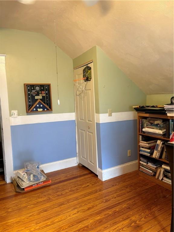 15 Villa Ave, Cranston, RI 02905 - bonus room featuring vaulted ceiling, wood finished floors, and baseboards
