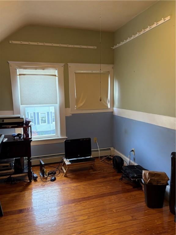 15 Villa Ave, Cranston, RI 02905 - home office with wood finished floors, baseboard heating, and vaulted ceiling